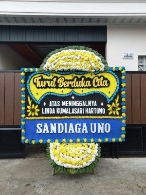 Papan Bunga Duka di Onan Runggu